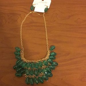 Green beaded necklaces.